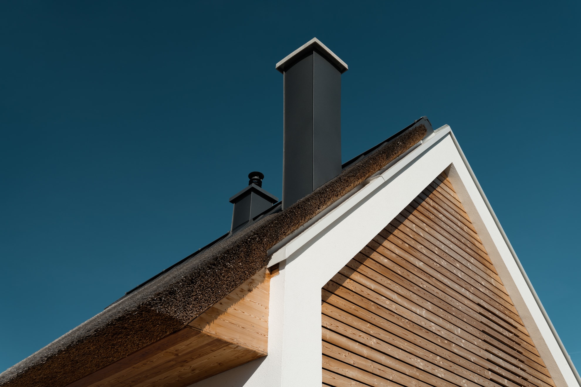 Close-up view of a reef roof and a chimney
